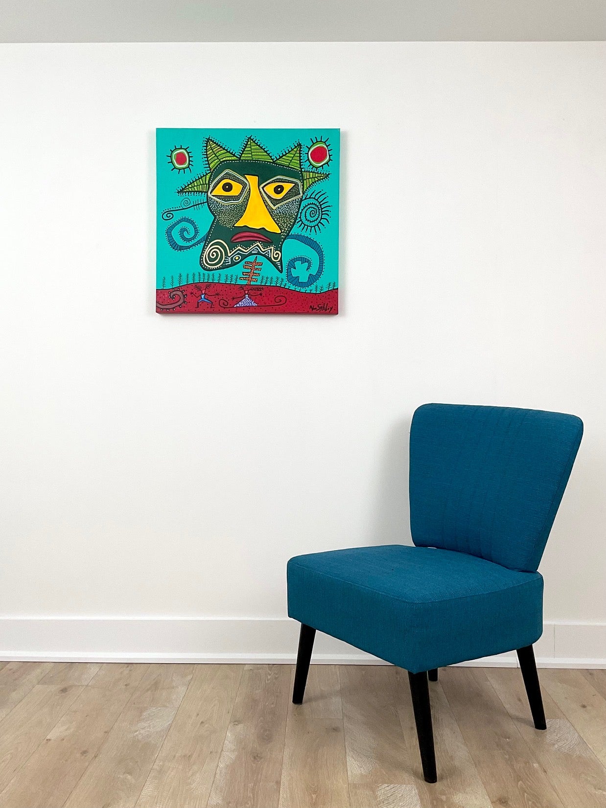 Mask Looking Over Man and Woman