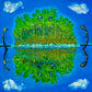 Island with trees reflected in water, surrounded by blue sky and clouds